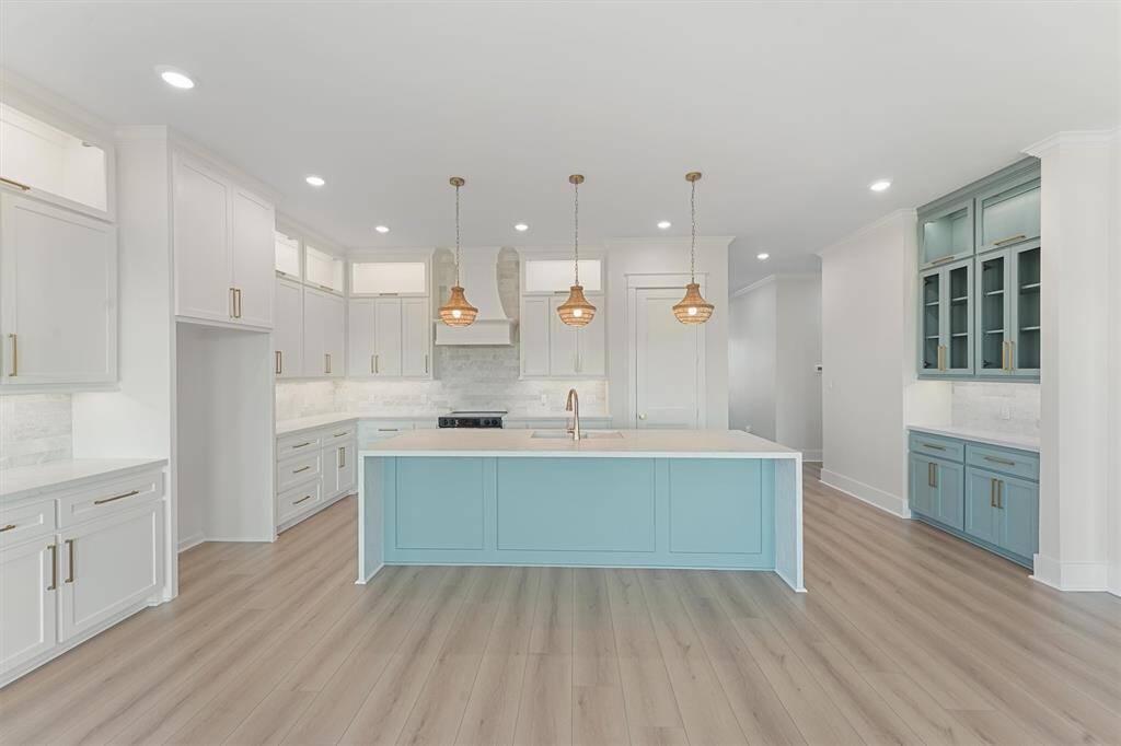 The photos shown are from a previously completed property by SL Walker Builders and are provided as a sample of the quality and craftsmanship you can expect. Please note that the floor plan, elevation, interior design, and colors will differ from the current build. For details specific to this property, contact us today!