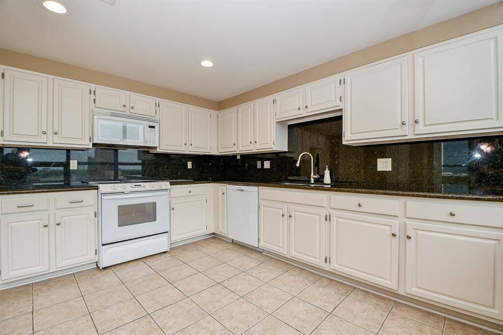 Kitchen has granite counter tops