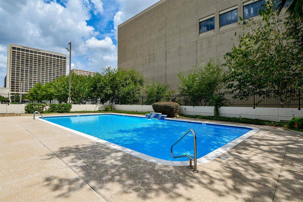 Resort style pool allows for swimming laps and lounging