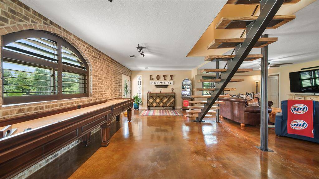 1st Floor has a Cool Staircase & Lots of Space for Game Nights.  COUNTY Property that lies outside local ETJ's - Peaceful, Private Community!
