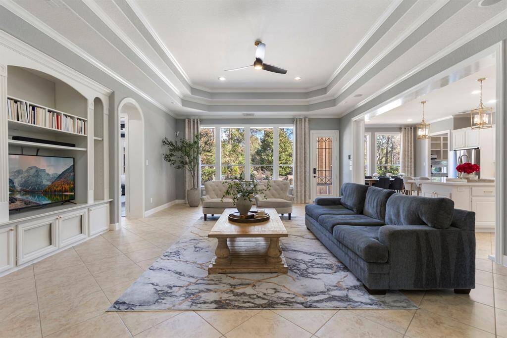 Enjoy a light and bright open floorplan, perfectly designed to highlight the incredible view of the backyard oasis, creating a seamless flow between indoor and outdoor living.