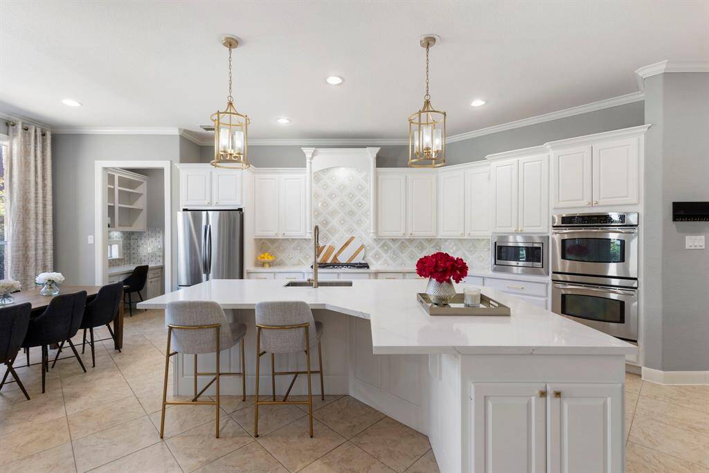 Step into a gorgeous, recently updated kitchen that’s perfect for both cooking and entertaining.