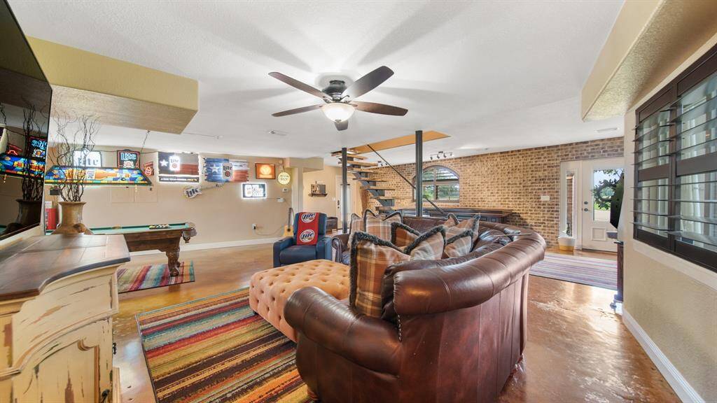 Unique & Fun Home for Indoor & Outdoor Activities. Amazing Outdoor Lakes, Boating, Fishing & Sunbathing, plus Lounging Shaded Patios. So Much to Offer!