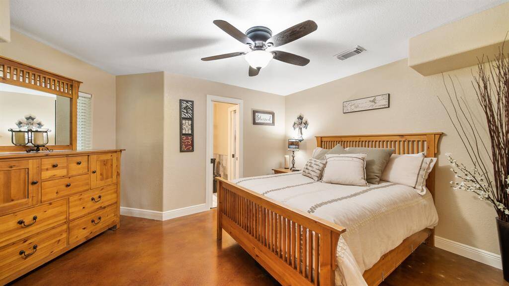 1st Floor Bedroom Suite with Relaxing Neutral Paint Palette, Ceiling Fan & Attached Full Bath