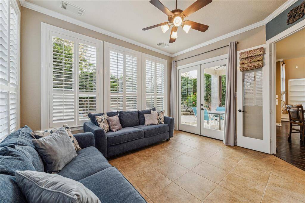 Another view of the sunroom that leads to the backyard.