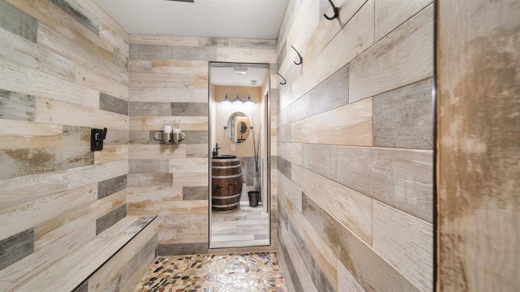 Great 1st Floor Bathroom Layout for Washing off after Outdoor Adventures. Notice the Fun Barrel Sink to bring out a smile.