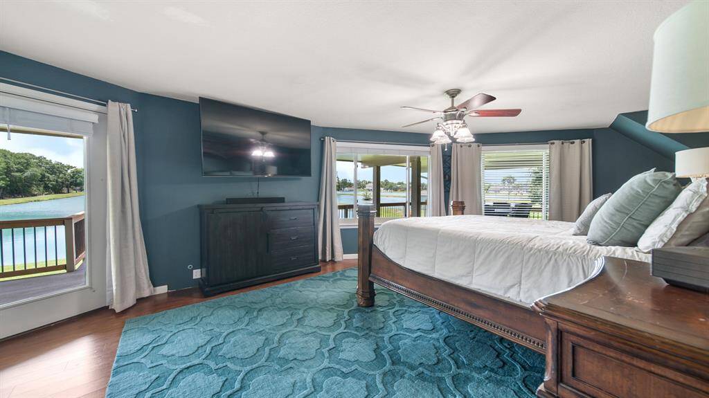 Primary Owner's Suite has Large Windows with LAKE Views. This Home offers the true meaning of a "Stay-cation", feel like you're at a Retreat everyday.