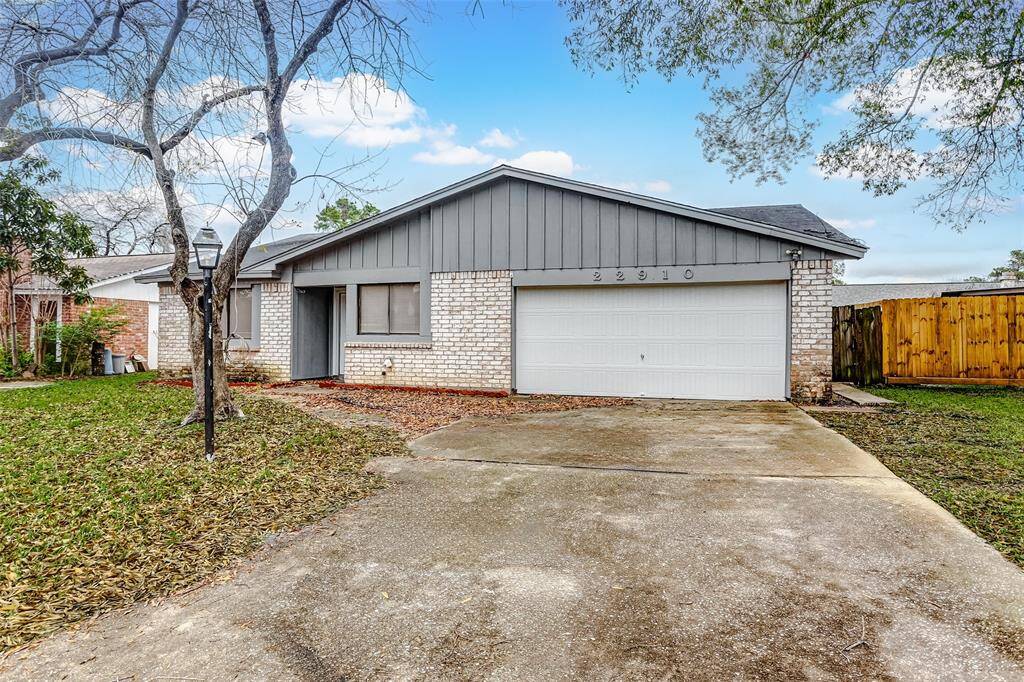 Welcome to your new home at 22910 Summer Green Lane! This charming traditional-style home sits on a spacious lot, featuring a well-maintained exterior with a light gray brick facade. The double driveway leads to a two-car garage, offering convenience and functionality. Mature trees frame the front yard, providing shade and adding curb appeal. Situated on a peaceful cul-de-sac, this home blends tranquility with a family-friendly vibe.