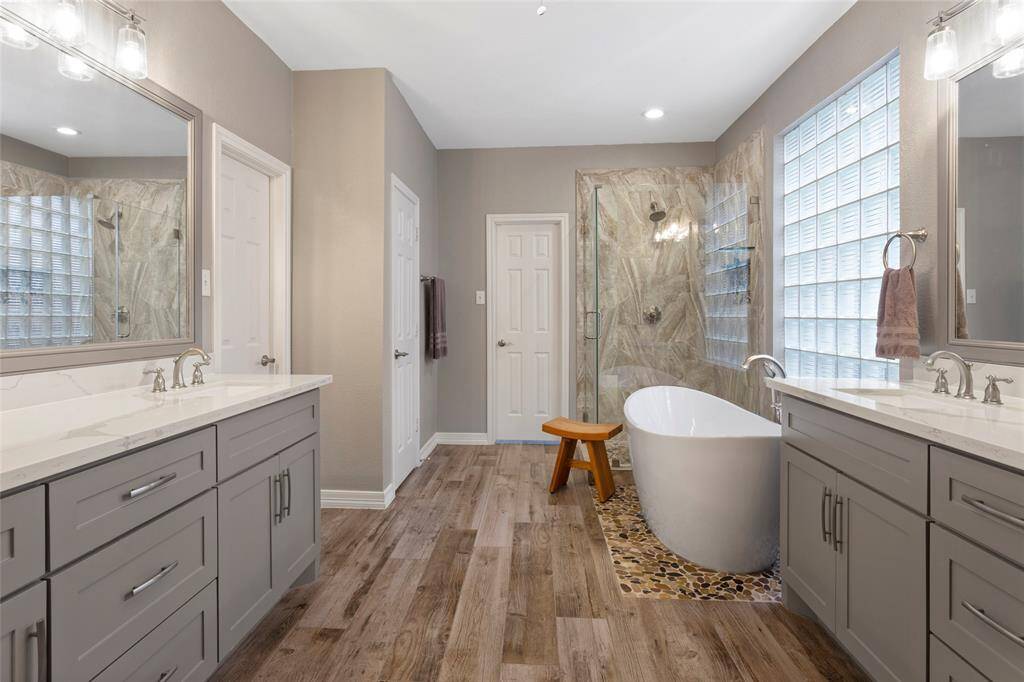 Primary bath completely updated 2019 with new cabinets, quartz countertops, hardware, plumbing and more!