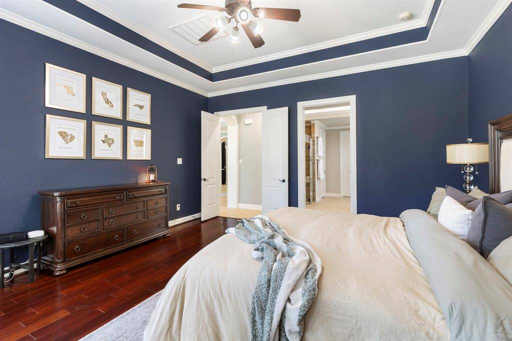 Another view of this perfect master retreat showcases the thoughtful design and ample space, creating a serene and inviting atmosphere that’s ideal for relaxation.