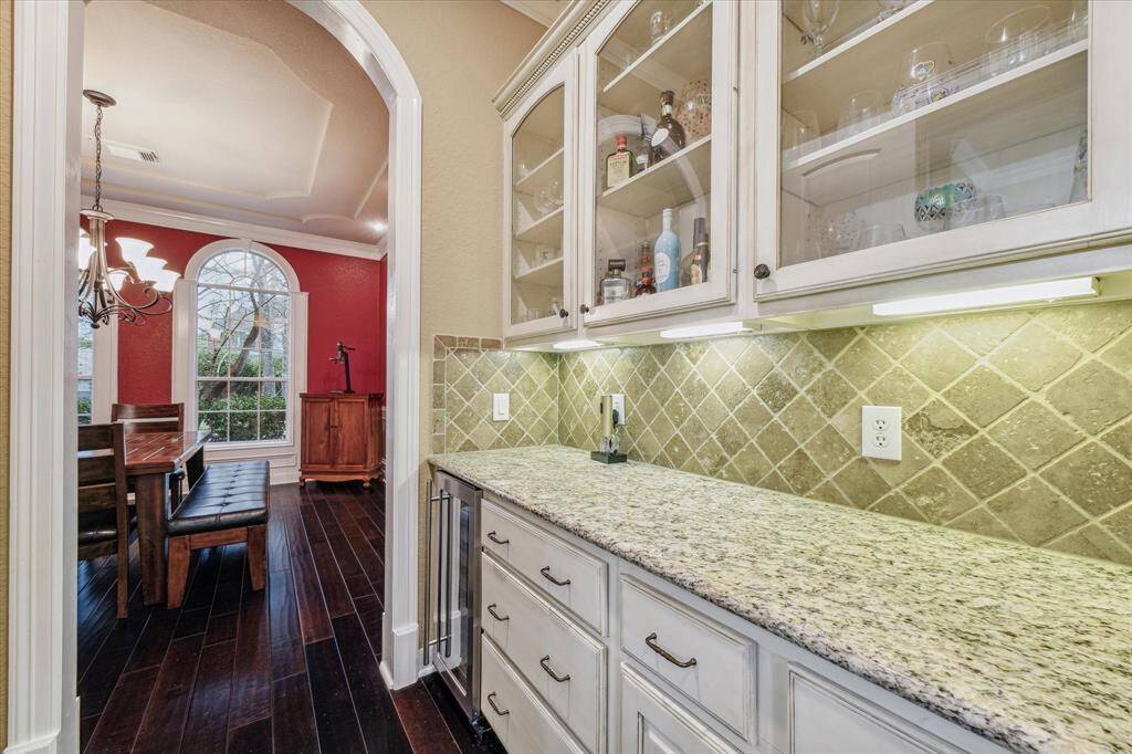 Butler's pantry area leading into the formal dining room.