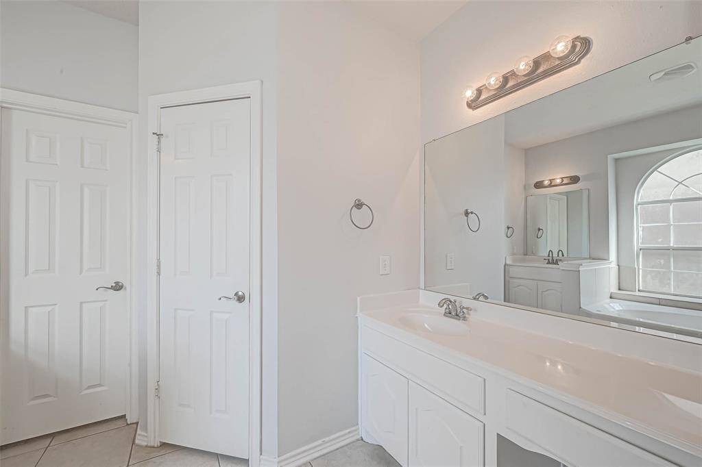 Primary bathroom duo vanities