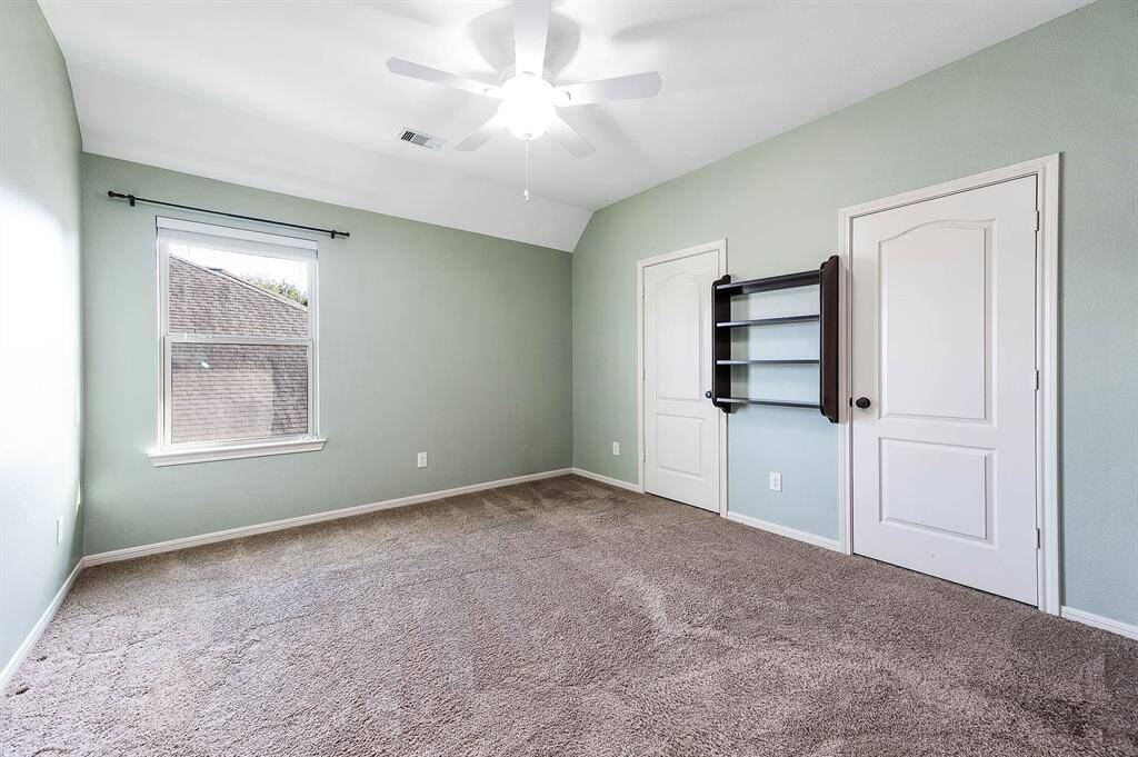 Secondary Bedroom with Jack/Jill Bath with private vanity and shared Tub/Shower.