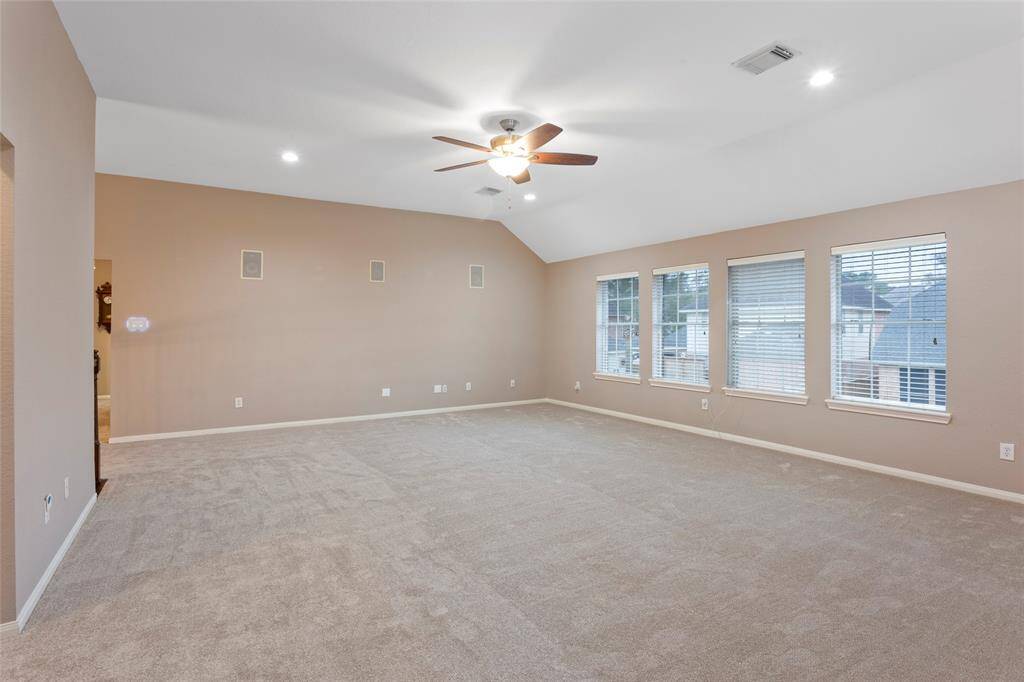 Gameroom is set up to double as a media room with built in Bowers & Wilkins surround sound.
