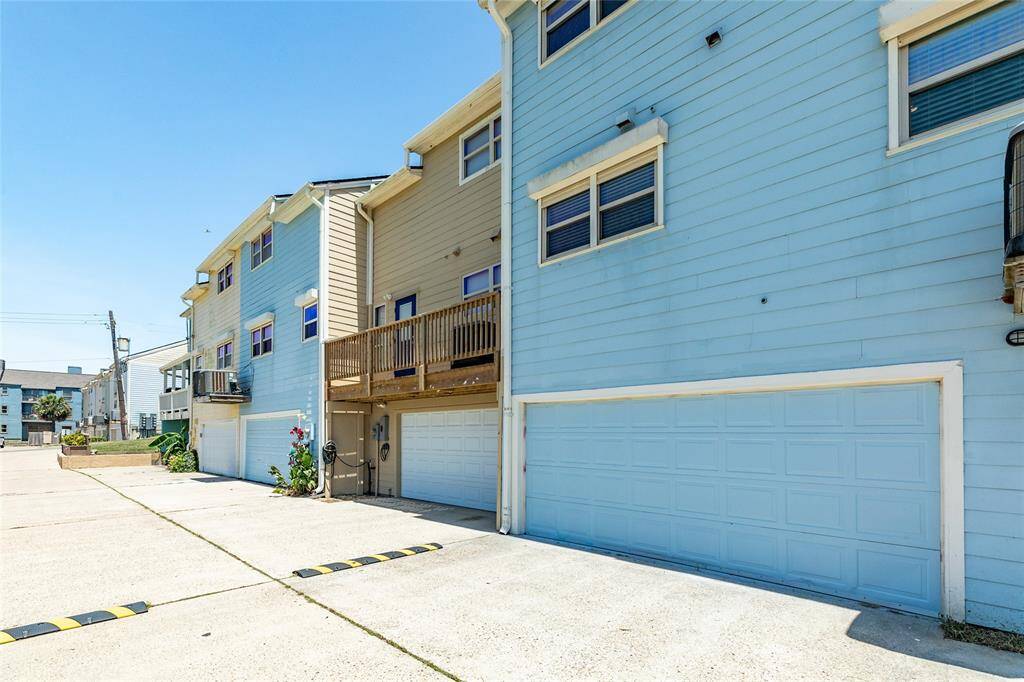 Attached garage at the back of the property. Garage floor has been refinished with an epoxy coating. Extra refrigerator & portable generator included in the sale