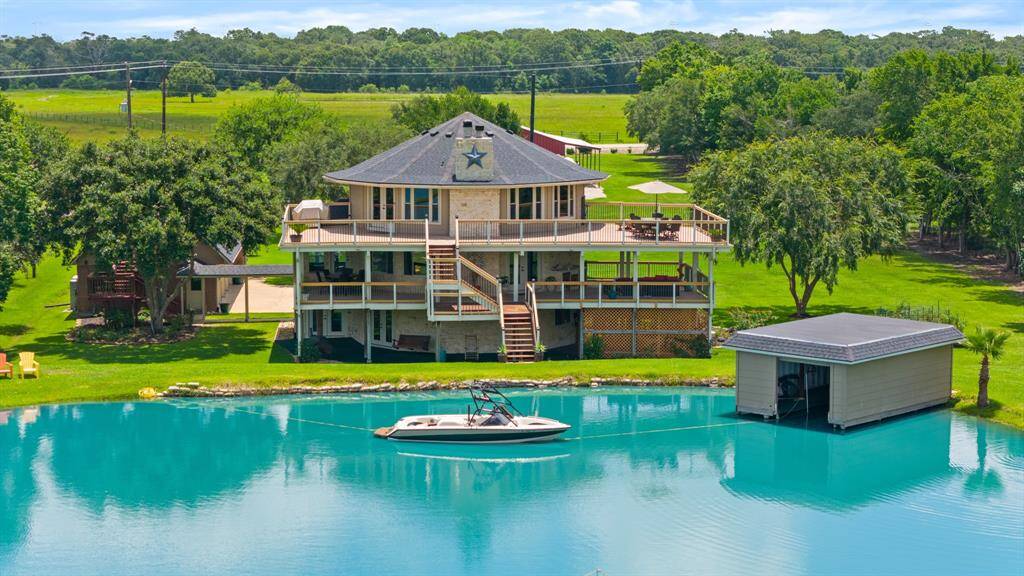 Decks Galore! Host all the Friends & Family Get-Togethers at your place. New Roof on the Main Home, Garage & Boat House December 2022. Private Boat House with Lift to Park your Boat.