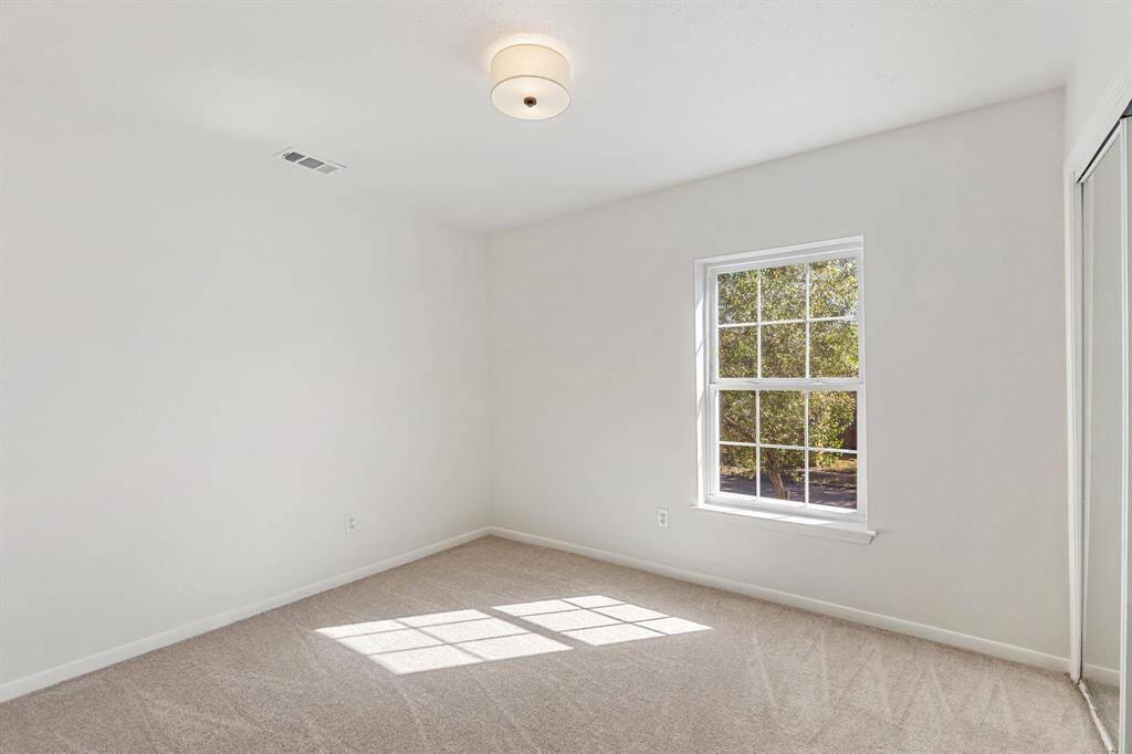 Bright, warm and inviting 2nd bedroom.