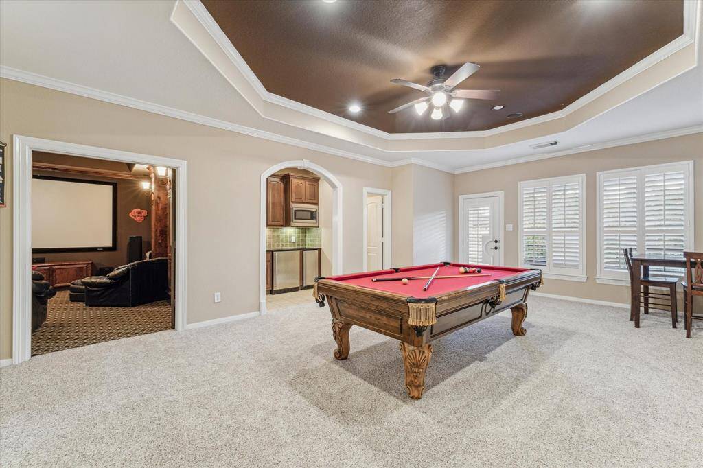 Gameroom area with access to the 2nd story balcony.
