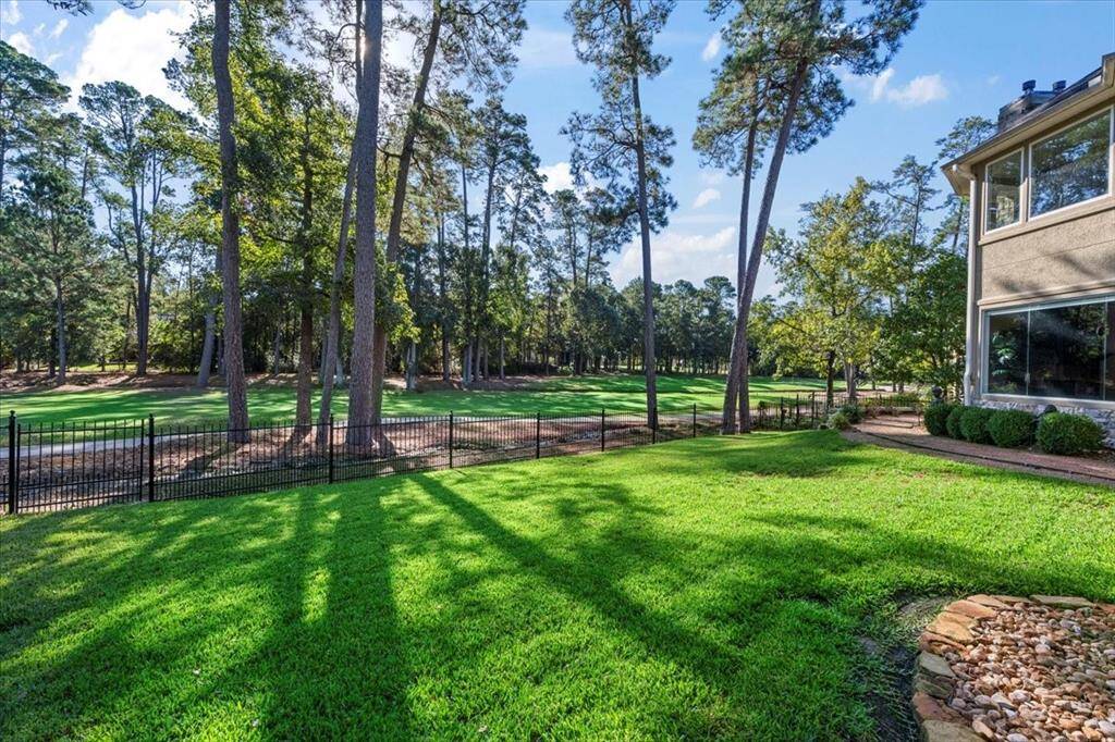 Wrought iron open fencing encloses this lot, allowing for expansive viewing.