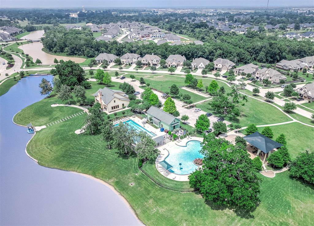 Gorgeous resort style amenities in your community, including Pool with Slide, Competition pool, Community & Fitness Center, Playground, Bocce Ball, Croquet Court, Walking/Jogging Trails!