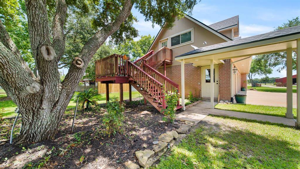 Upstairs Garage Apartment with Private Staircase Access. Potential Rental Income or Extended, Multi-Generational Family Home - Full Bath & Kitchen Included.
