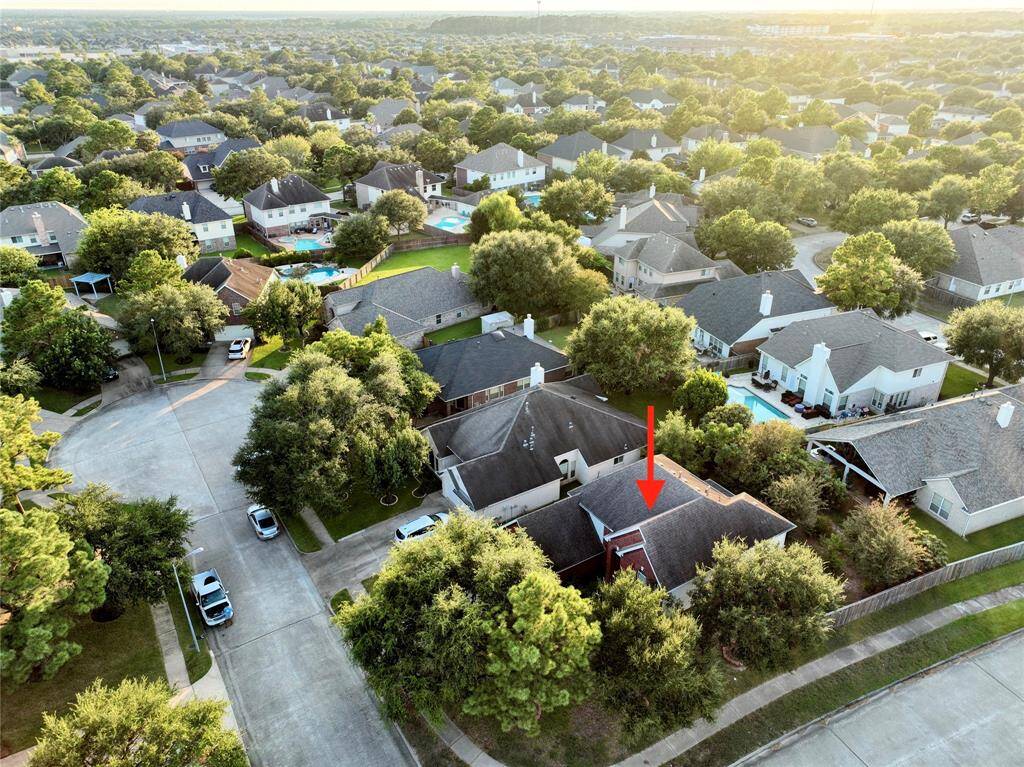 This ideal property is situated on a corner lot in a cul de sac with towering trees!