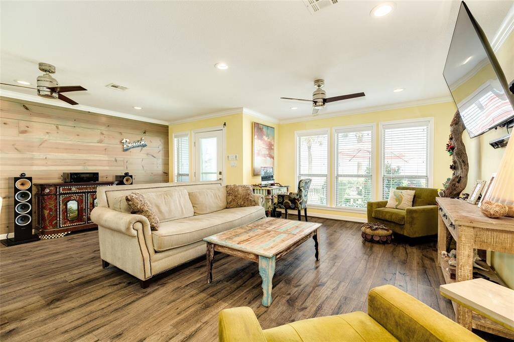 Beautiful high-end luxury vinyl flooring on the main level. Crown molding is featured throughout the home