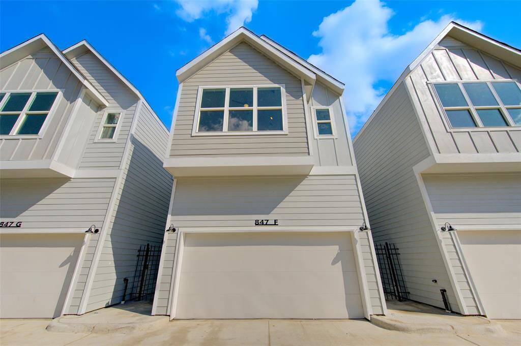 This stunning contemporary home boasts a sleek exterior design with clean lines and modern finishes. The two-car garage provides ample parking and storage space, while the large windows allow for plenty of natural light to brighten the interior. Located in a gated community, this home offers both security and style.