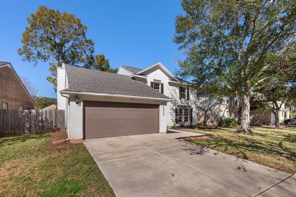 Charming two-story home. Features a spacious two-car garage and a well-maintained front yard with mature trees. Ideal for those seeking a cozy and inviting neighborhood setting.