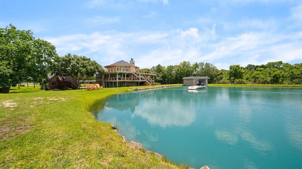 FISHING just a walk away from your Home. 5 Foot Deep Lake is great for a SWIM. You can als ocheck out an occasional SKI Tournament on the LAKE from your Back Lawn.