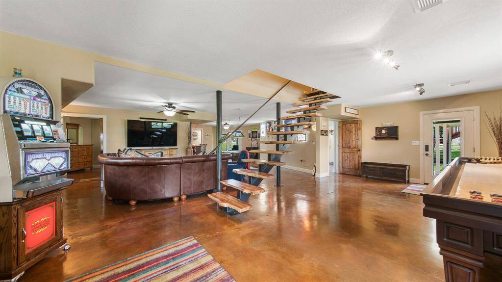 Welcome into the 1st Floor Fun, Entertaining Zone. This 1st Floor includes a Bedroom Suite wit hattached Full Bath, perfect for Extended Family or Guest Private Bedroom.