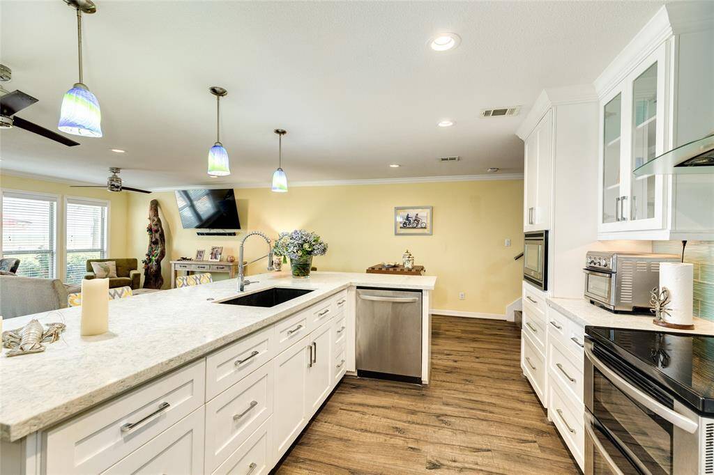 The island has loads of storage space and countertop prep area