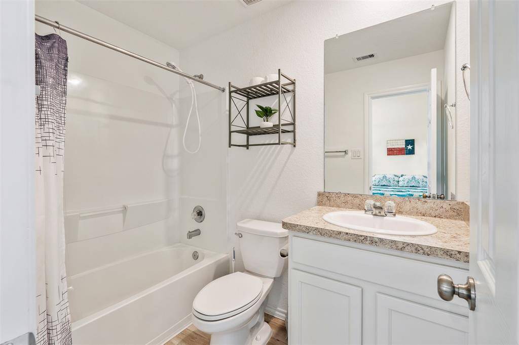 Next up is your primary bathroom, conveniently attached to your primary bedroom with a walk in closet to the right of your bathroom.