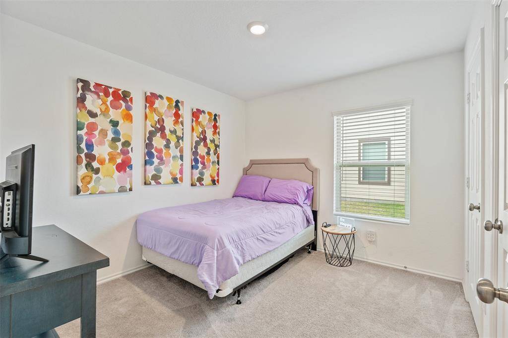 Next is your secondary bedroom on this side of the hallway with ample closet storage as well.