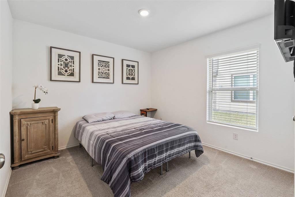 Here we are in another one of the spacious secondary bedrooms with plenty of room for a larger bed if need be!