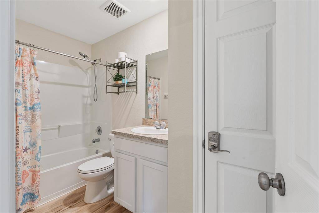 Remember that full bathroom we talked about previously? Tada! Here it is. It's also conveniently located off the living room so when you have to go, you don't have to go far. NICE!