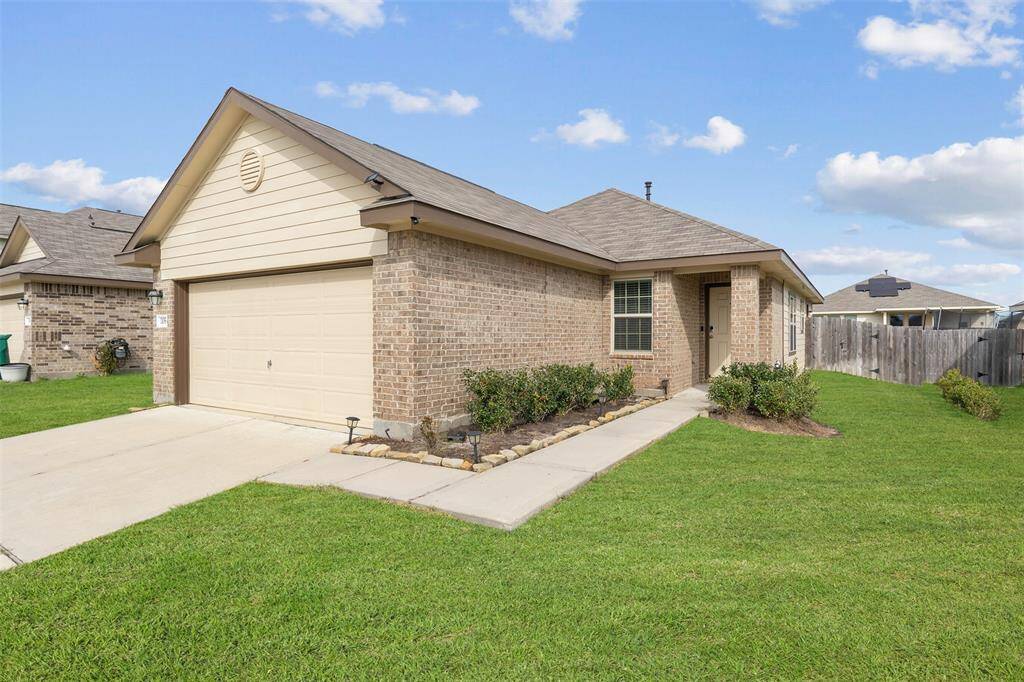 The beautiful brick exterior welcomes you home.