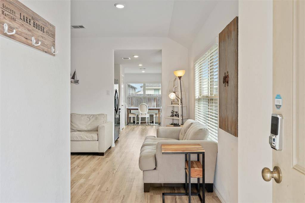 As you open your front door, you're greeted by beautiful natural light.