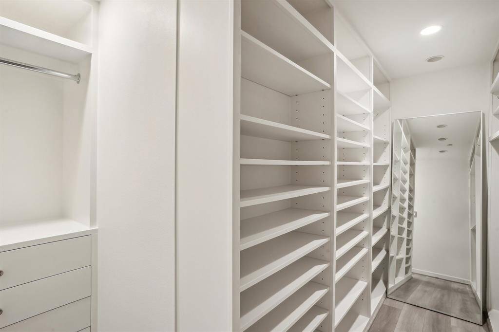 Custom closet in primary bedroom