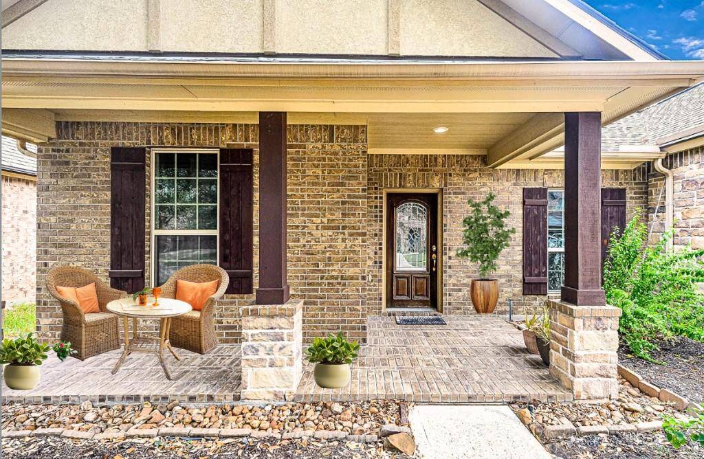 Covered front porch is the perfect spot to start your day while you enjoy your morning coffee.