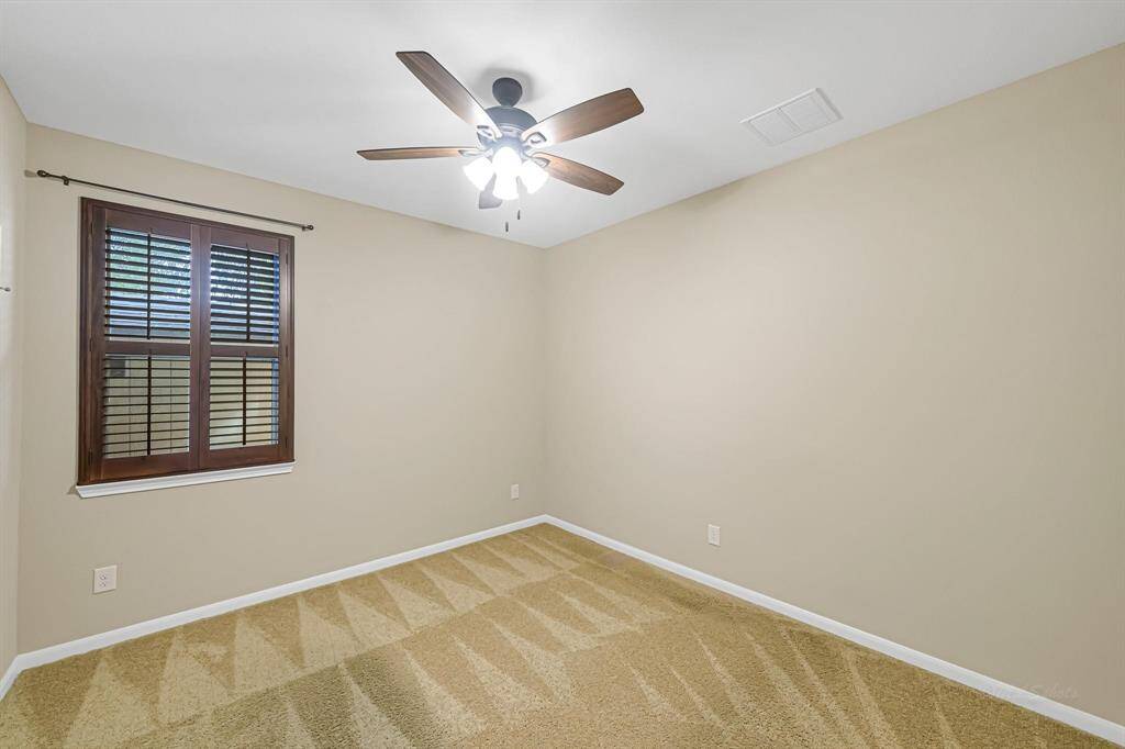 3 of 3 secondary bedrooms.