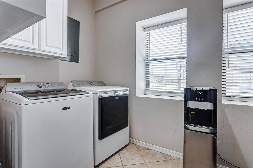 Enjoy the convenience of two laundry rooms—one here and another upstairs.