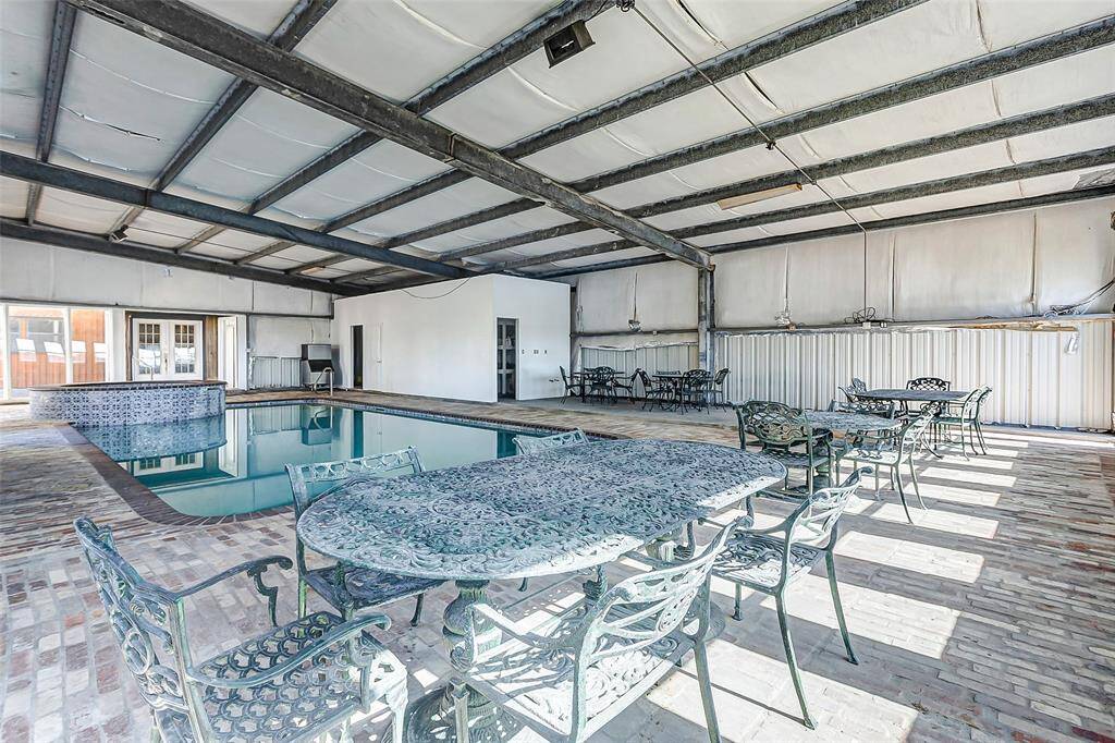 This fully gated estate features five versatile buildings, three private lakes and endless possibilities.