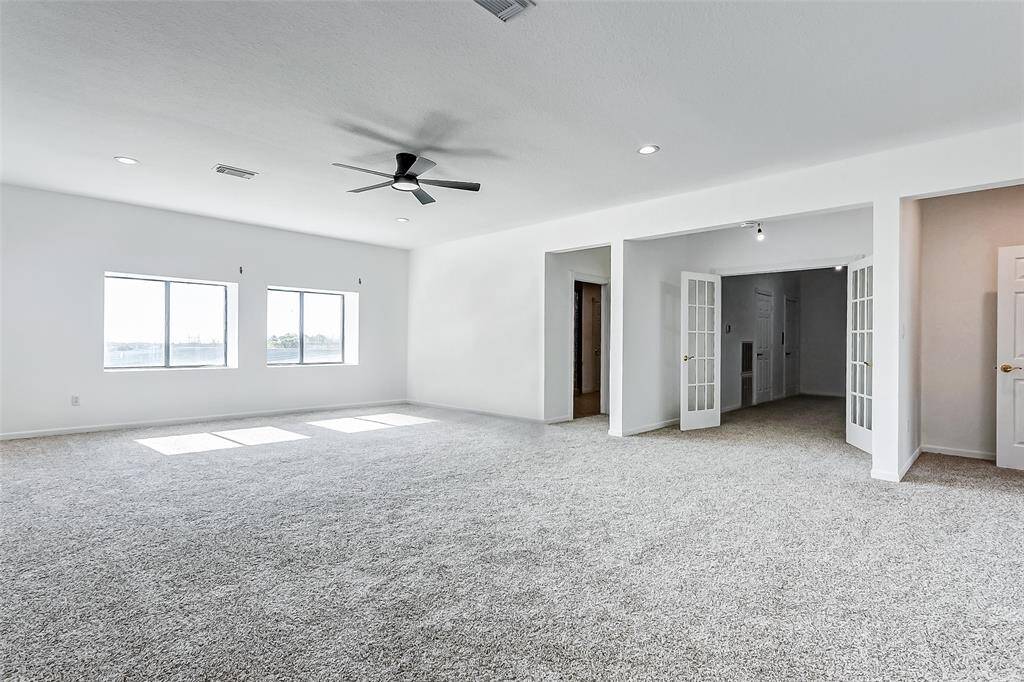 The primary suite is flanked with dual ensuite bathrooms, providing both elegance and convenience.