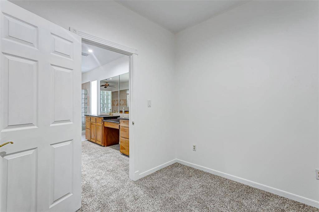 Versatile space ideal for a home office or extra storage.