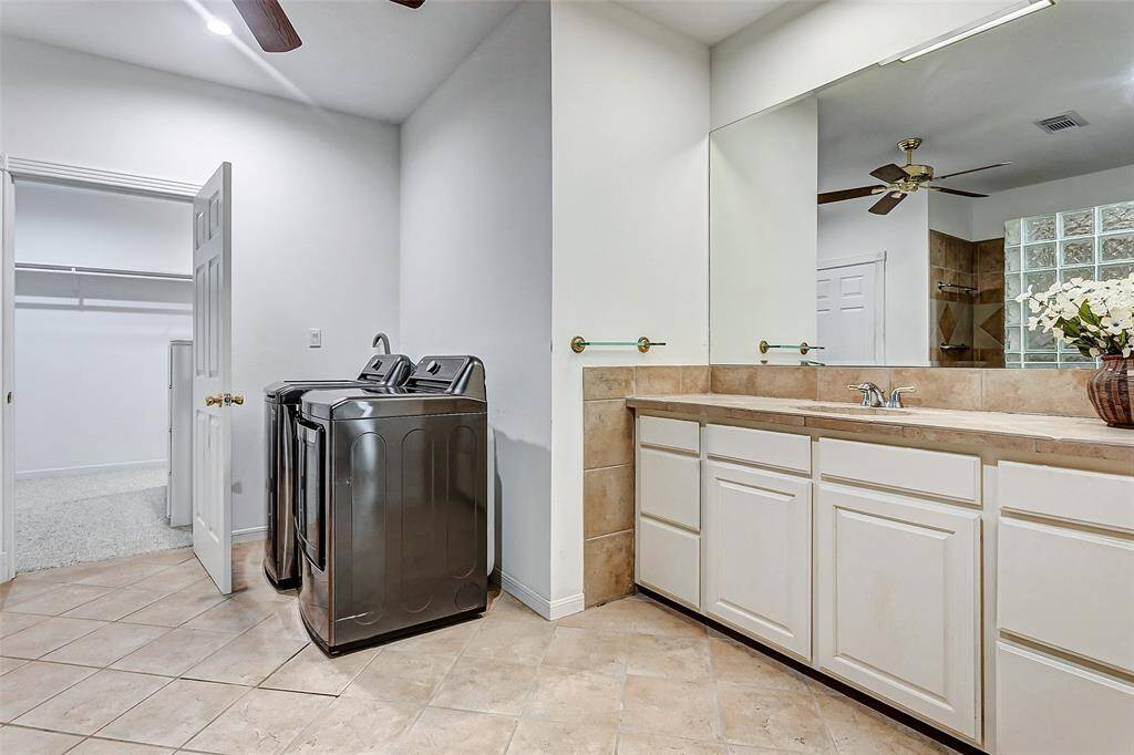 In addition to the main level laundry room, enjoy the convenience of a washer and dryer upstairs.