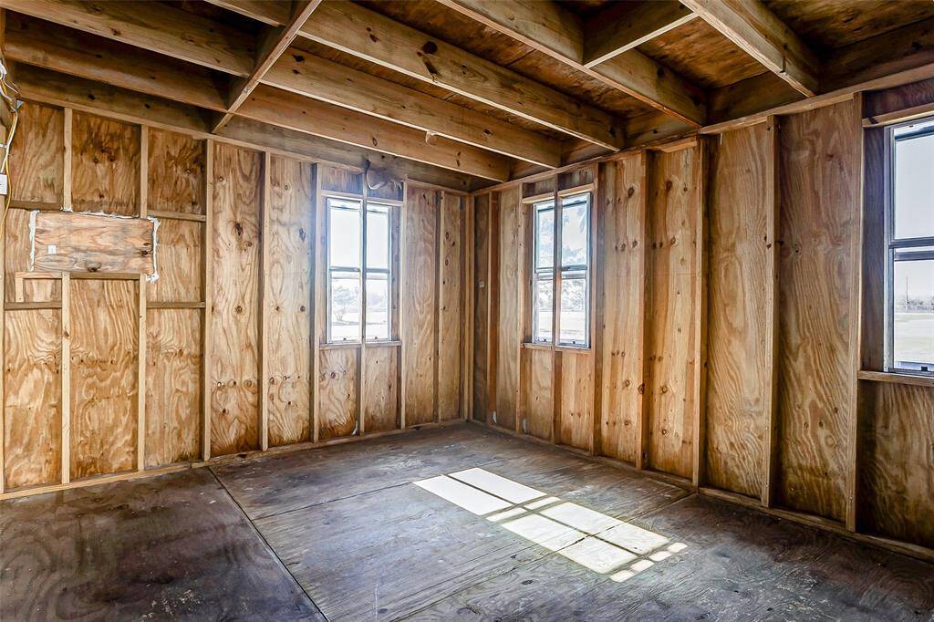 Adjacent to the pool house, this framed addition offers endless possibilities for customization.