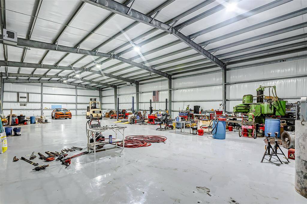 The expansive climate-controlled warehouse offers exceptional versatility, perfect for various uses.