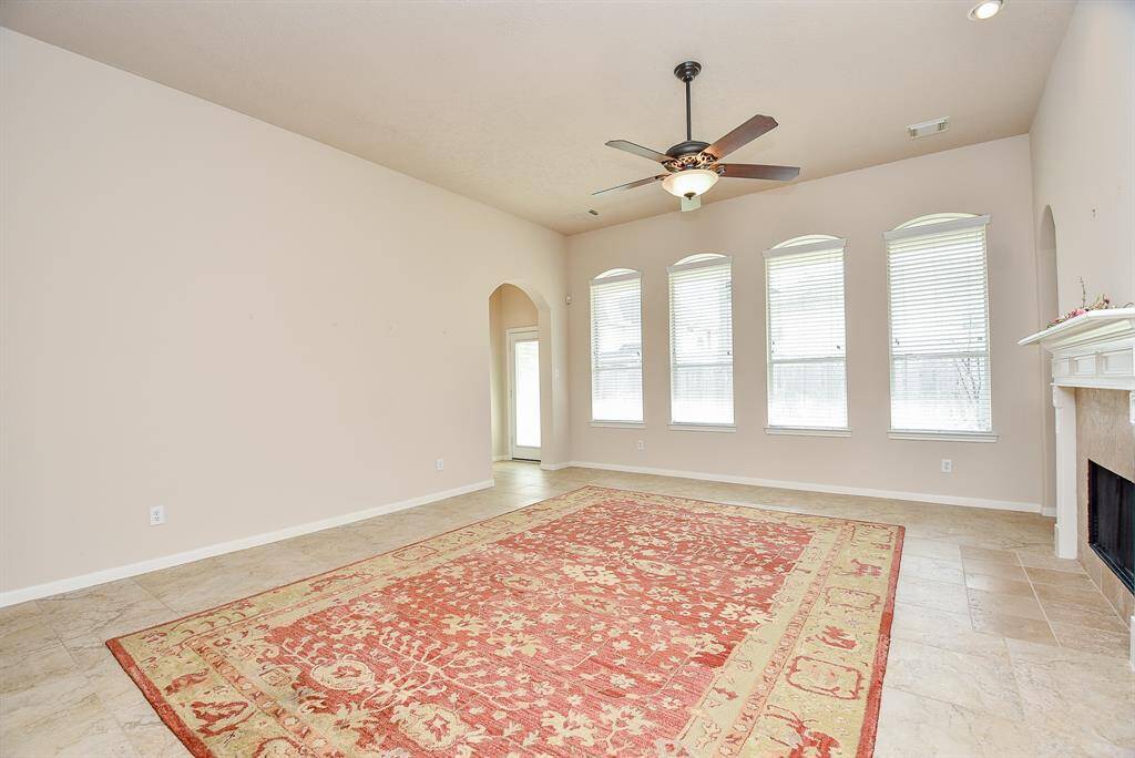 What a marvelous view of a wall of windows, and stately built-in fireplace, right.