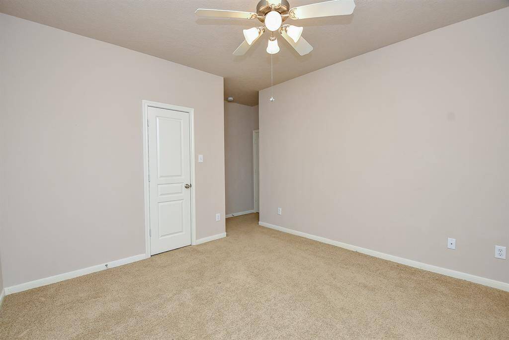 Relax and refresh in this spacious secondary bedroom.